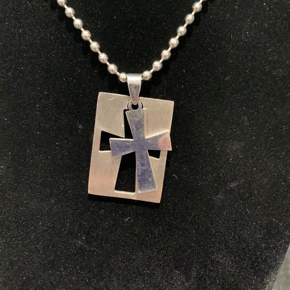 $5 add-on to any Bundle!!  
Metal cross cut-out pennant and chain